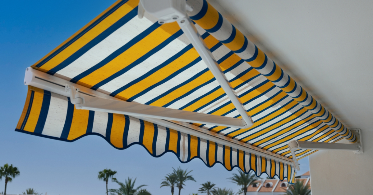 white, blue, and yellow outdoor awning